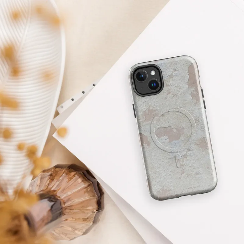 Glossy Ancient Plaster Wall MagSafe Tough Case for iPhone — peeling white paint over aged plaster wall with soft rose