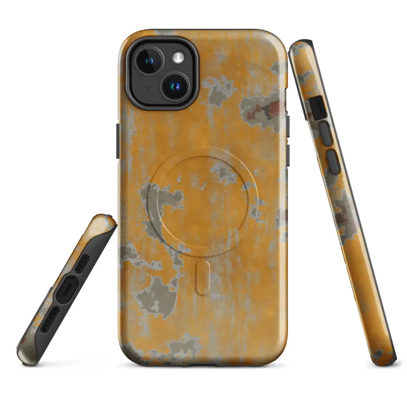 Glossy Urban Decay Weathered Wall MagSafe Tough Case for iPhone — peeling amber and orange paint revealing gray plaster