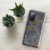 Glossy Urban Decay Peeling Paint Tough Case for Samsung — peeling steel-blue paint revealing sandy plaster and rust-red