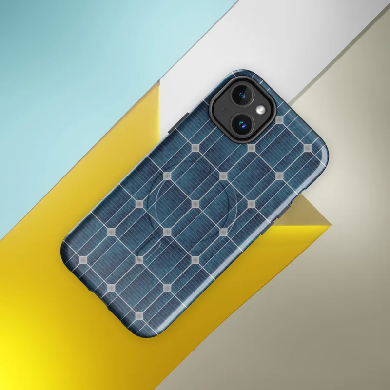 Glossy Solar Power MagSafe Tough Case for iPhone — repeating grid of deep navy and teal solar photovoltaic cells framed