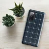 Glossy Solar Panel Tech Tough Case for Samsung — close-up solar panel pattern with deep navy blue octagonal cells divided