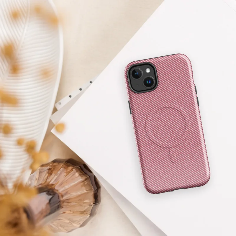 Glossy Crimson Twill Classic MagSafe Tough Case for iPhone — diagonal red and white twill stripe pattern resembling woven