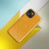 Glossy Golden Hour Linen Weave MagSafe Tough Case for iPhone — close-up woven linen fabric texture in warm amber and golden