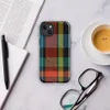 Glossy Highland Bold Plaid MagSafe Tough Case for iPhone — vibrant tartan plaid pattern in deep black, electric teal, fiery