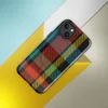 Glossy Highland Bold Plaid MagSafe Tough Case for iPhone — vibrant tartan plaid pattern in deep black, electric teal, fiery