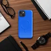 Glossy Electric Blue Serenity MagSafe Tough Case for iPhone — solid electric blue surface with subtle crackled weathered