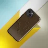 Glossy Cracked Earth Desert MagSafe Tough Case for iPhone — cracked dry earth texture in deep chocolate brown with organic