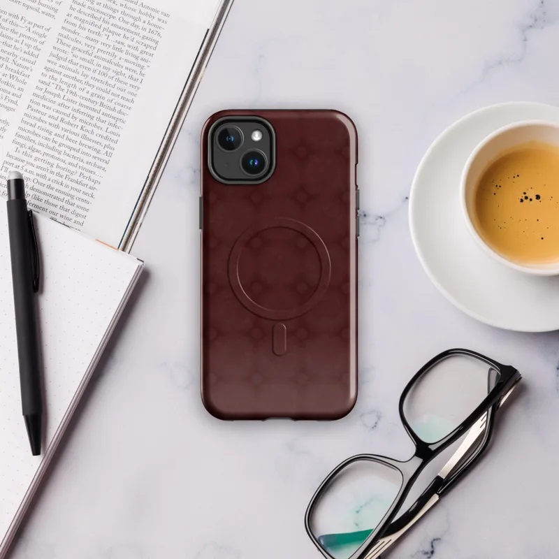 Glossy Crimson Grid Elegance MagSafe Tough Case for iPhone — repeating burgundy lattice pattern with softly blurred diamond