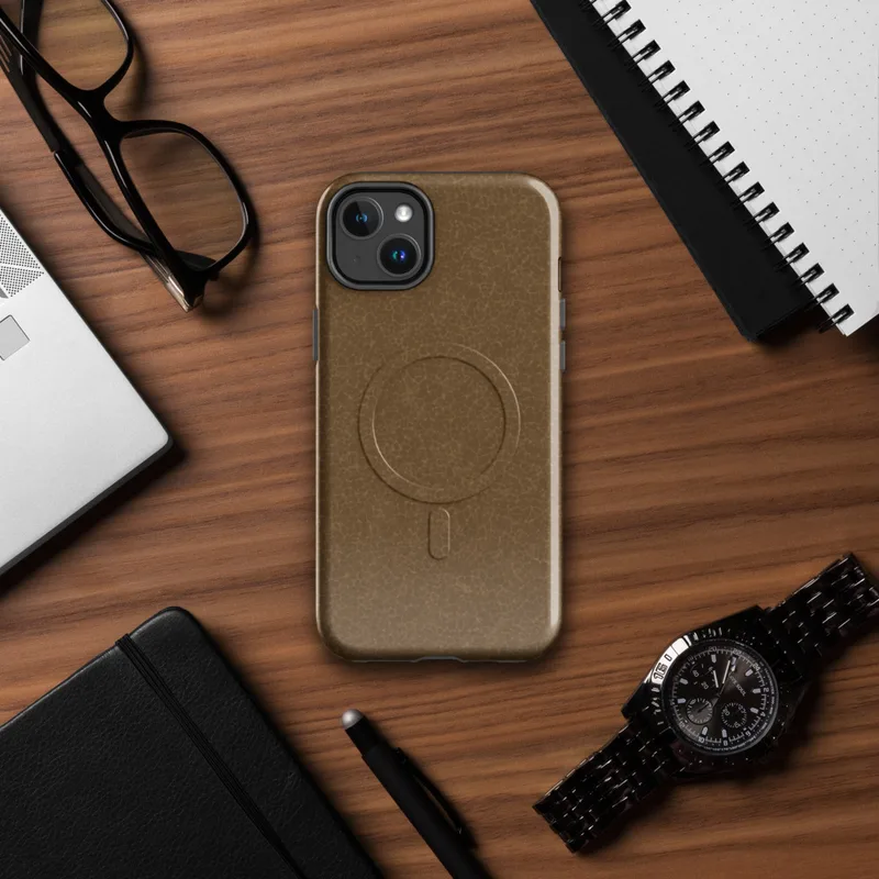 Glossy Weathered Leather Terrain MagSafe Tough Case for iPhone — crackled leather surface texture in warm amber and saddle