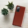 Glossy Crimson Ember Tough Case for Samsung — deep crimson red surface with subtle crackled mosaic texture and warm ember