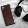 Glossy Worn Leather Heritage Tough Case for Samsung — aged mahogany leather surface with amber and tan crackle veining