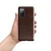 Glossy Worn Leather Heritage Tough Case for Samsung — aged mahogany leather surface with amber and tan crackle veining