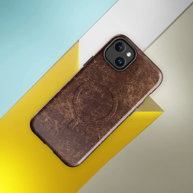 Glossy Worn Leather Vintage MagSafe Tough Case for iPhone — distressed leather texture in deep burgundy and warm tan