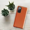 Glossy Burnt Orange Velvet Tough Case for Samsung — solid burnt orange surface with subtle warm texture variation across