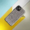 Glossy Raw Industrial Fiber Texture MagSafe Tough Case for iPhone — close-up photorealistic compressed gray-brown fiber mat