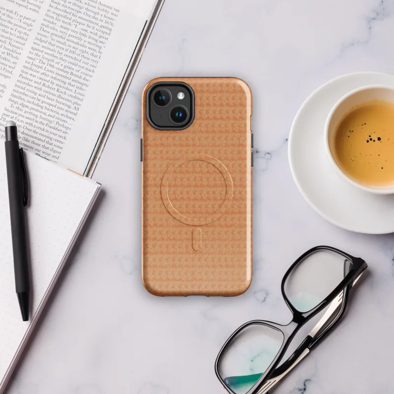 Glossy Warm Peach Knit Texture MagSafe Tough Case for iPhone — close-up repeating crochet knit texture in warm peach