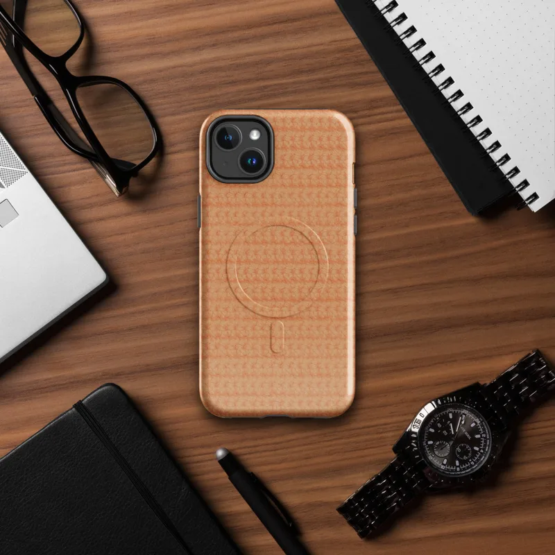 Glossy Warm Peach Knit Texture MagSafe Tough Case for iPhone — close-up repeating crochet knit texture in warm peach