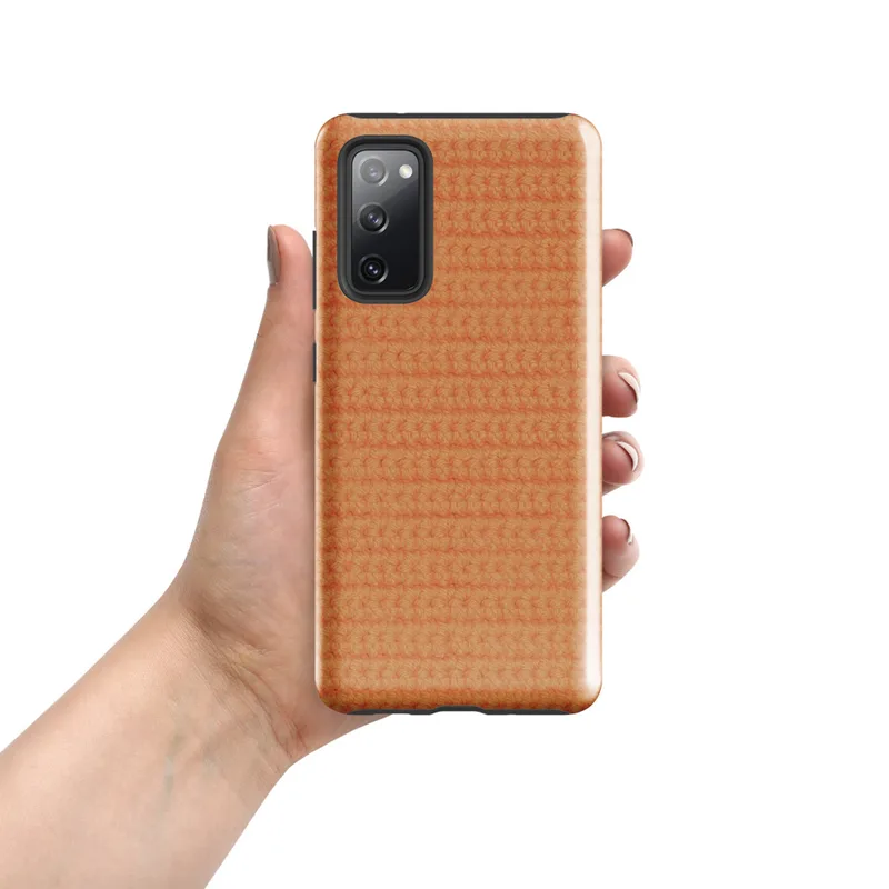 Glossy Warm Peach Woven Texture Tough Case for Samsung — close-up photorealistic knitted fabric texture in warm peach-orange