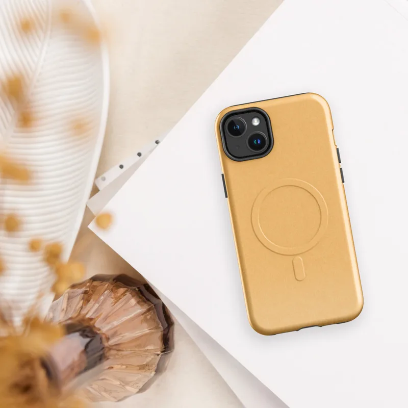 Glossy Warm Apricot Minimal MagSafe Tough Case for iPhone — solid warm apricot tone with a subtle paper texture, soft