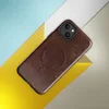 Glossy Worn Leather Legacy MagSafe Tough Case for iPhone — distressed leather surface in deep mahogany with cracked amber