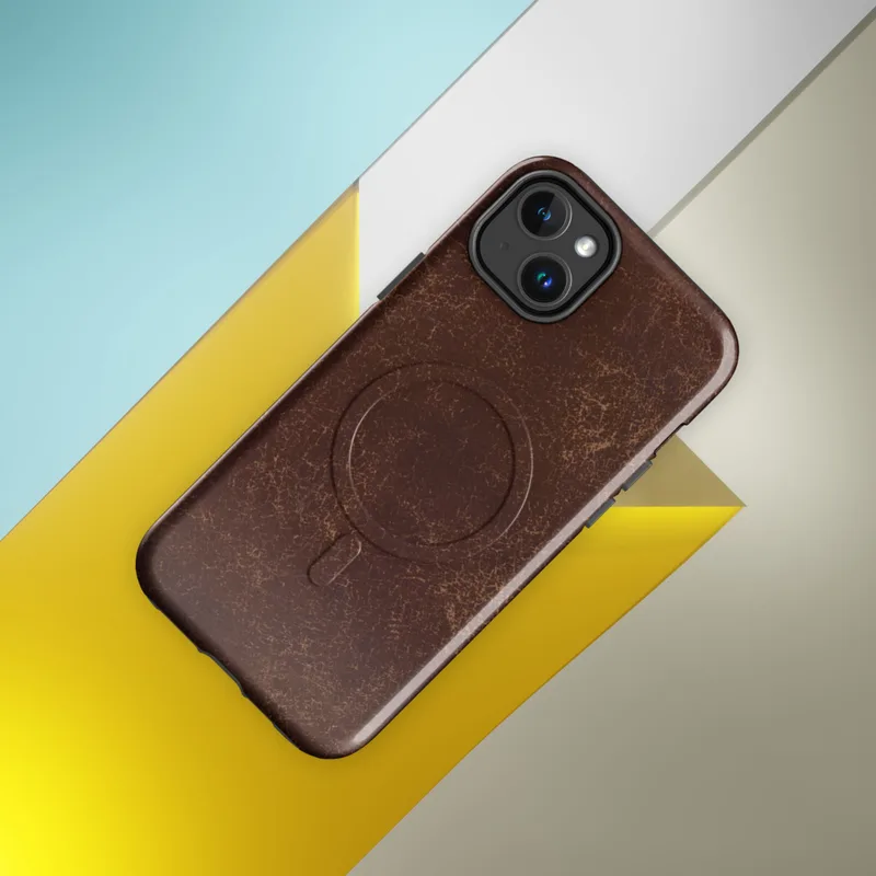 Glossy Worn Leather Legacy MagSafe Tough Case for iPhone — distressed leather surface in deep mahogany with cracked amber