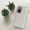 Glossy Clean Slate Minimal Tough Case for Samsung — smooth warm gray surface with subtle organic noise texture and soft
