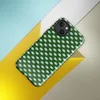 Glossy Grid Weave Green MagSafe Tough Case for iPhone — repeating woven basket-weave grid pattern in deep forest green