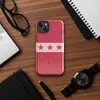 Glossy Red Star Band MagSafe Tough Case for iPhone — row of seven dark crimson five-pointed stars on a pale pink horizontal