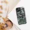 Glossy Circuit City Camo MagSafe Tough Case for iPhone — aerial view of a dense cyberpunk cityscape in forest green, mint