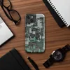 Glossy Circuit City Camo MagSafe Tough Case for iPhone — aerial view of a dense cyberpunk cityscape in forest green, mint
