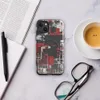 Glossy Circuit City Chaos MagSafe Tough Case for iPhone — aerial city grid abstraction in deep crimson, white, and charcoal