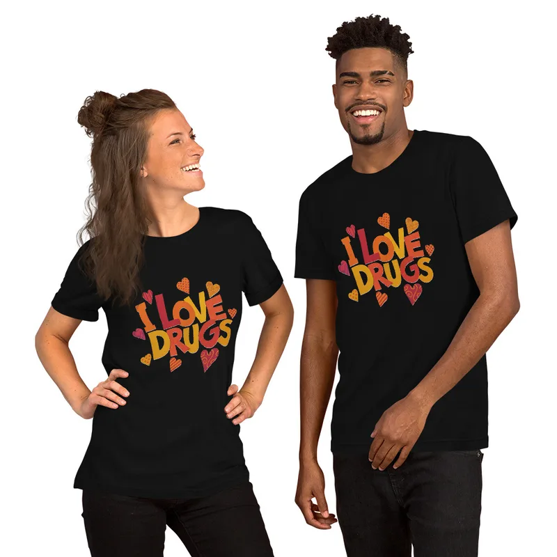 Black I Love Drugs Bold Statement Tee — bold chunky lettering reading I Love Drugs in warm orange red and yellow tones