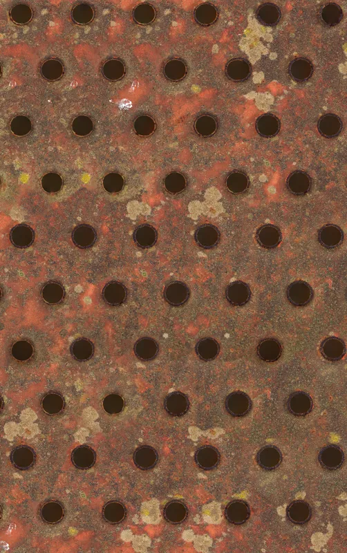 Industrial Rust Perforated Metal Tough Case for iPhone design — close-up of heavily rusted perforated steel plate with rows